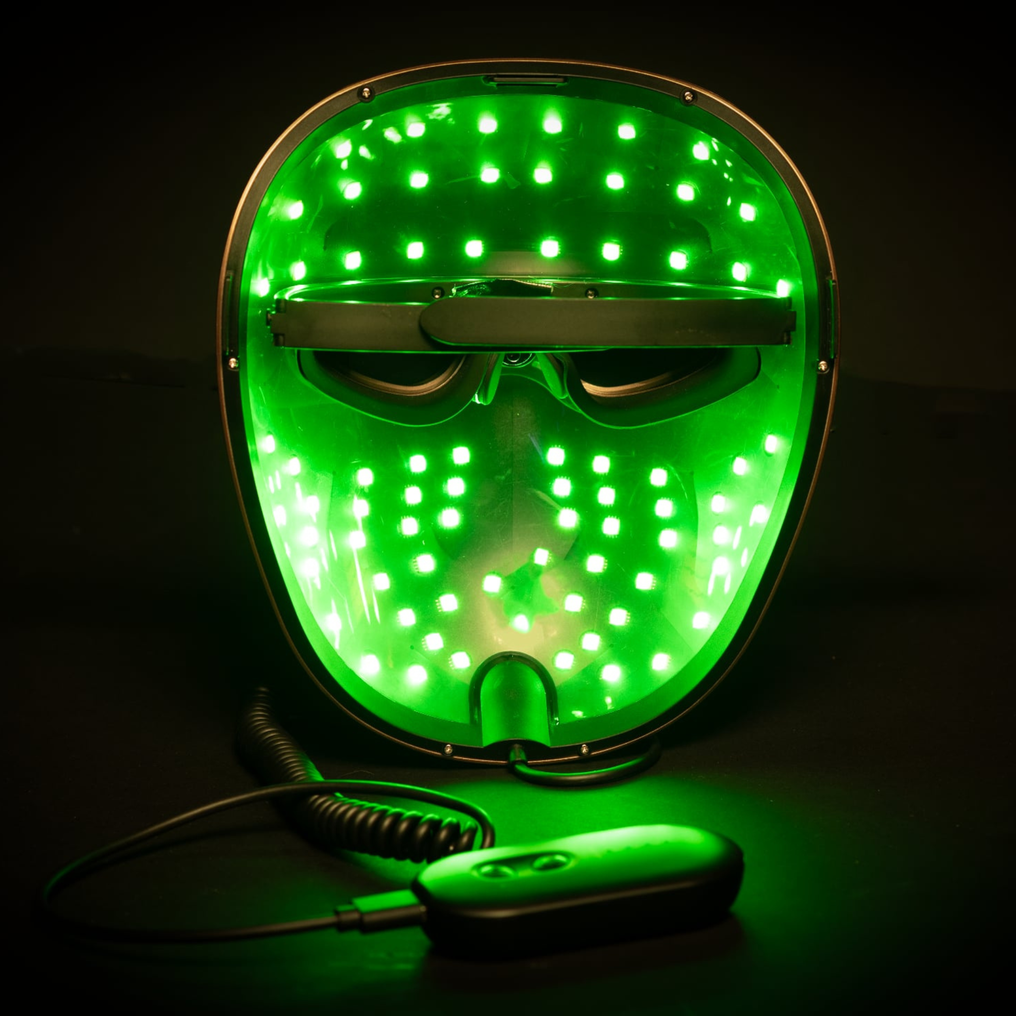 [icture shows the inside of the led mask with the green led bulbs as green with the controller nearby