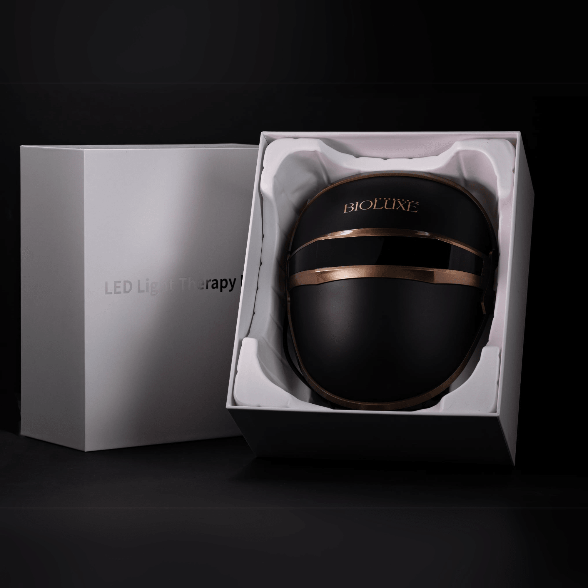 Bioluxe black LED facial therapy mask with 8 colours presented in white box